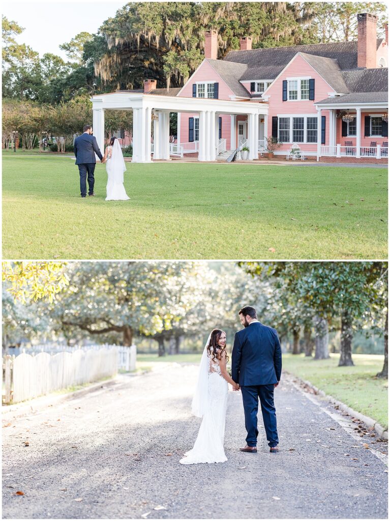 Newlyweds hold hands in the middle of a road with a white picket fence
