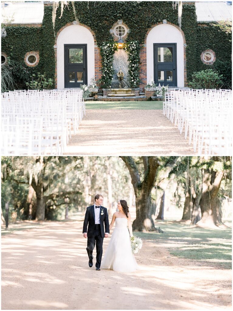 Newlyweds walk down an unpaved road lined with oak trees while holding hands.