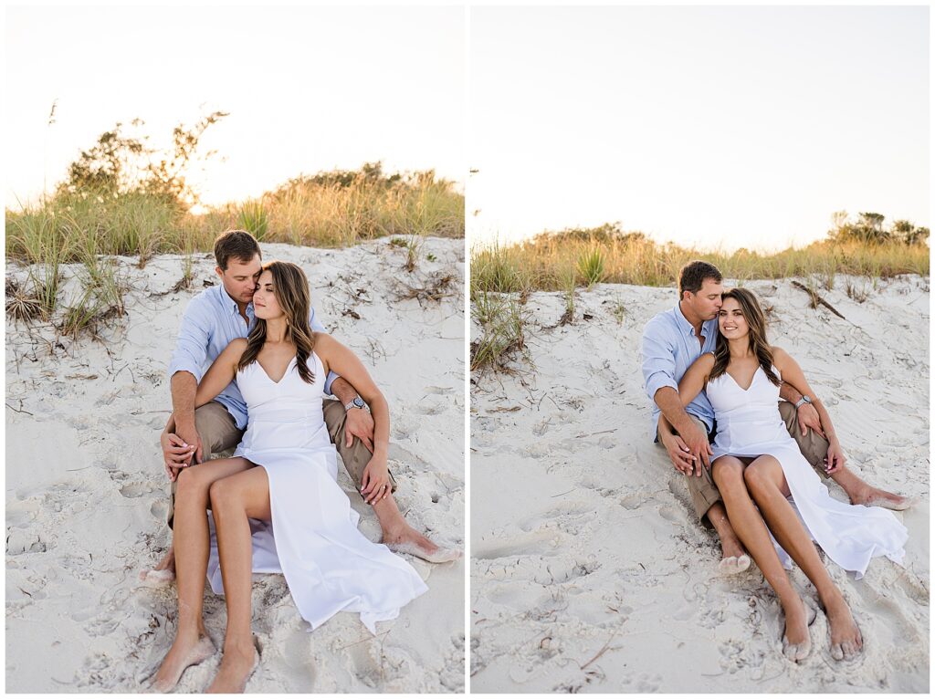 Candid photo of engaged couple smiling at each other during sunset at Mashes Sands Beach in Panacea, Florida