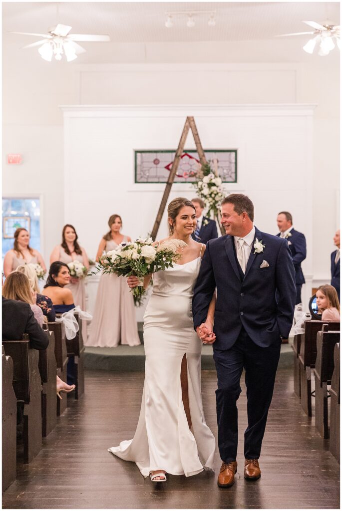bride and groom wedding ceremony in the chapel at shiloh farm in tallahassee
