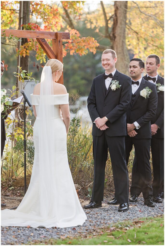 Bride walking barefoot down the aisle at a small coastal North Florida wedding