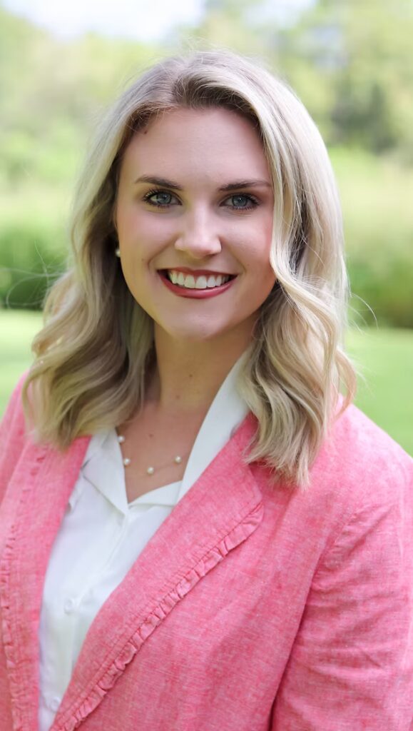 jenna is a tallahassee wedding planner taking headshots 