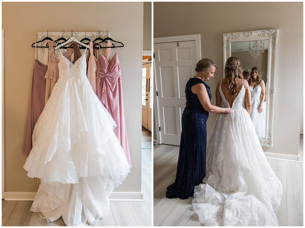 mother helping bride put dress on 