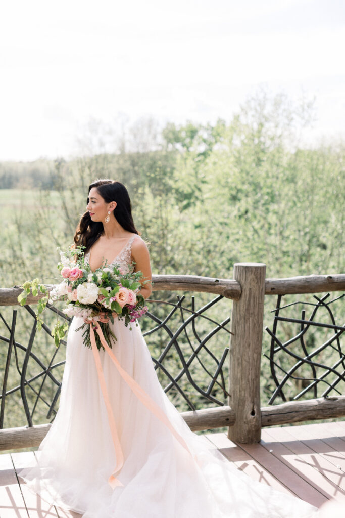 bride in wedding dress with bridal bouquet