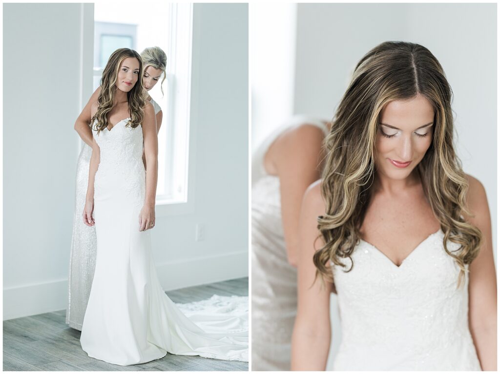 Mother of bride helping Audrey with her dress at their 30A beach house rental.