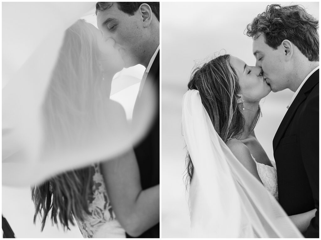 Romantic black-and-white photo of the couple on the fog-covered shoreline.
