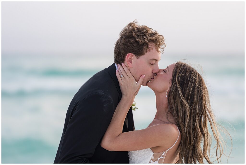Close up bride and groom kissing