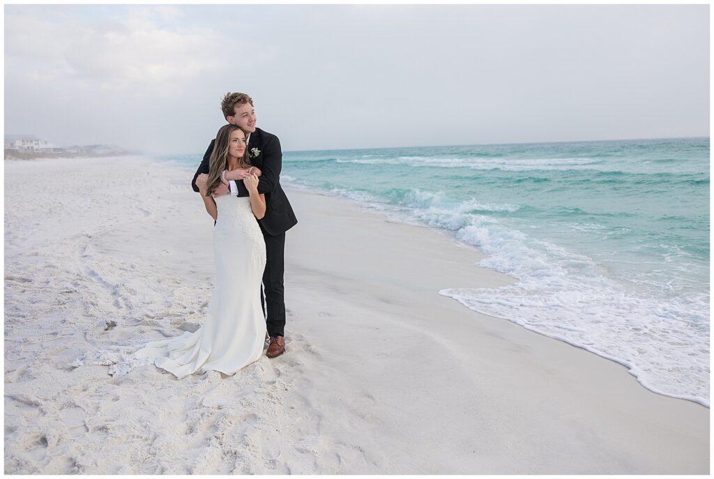 Soft coastal fog surrounding the couple during their Santa Rosa Beach beach portraits.