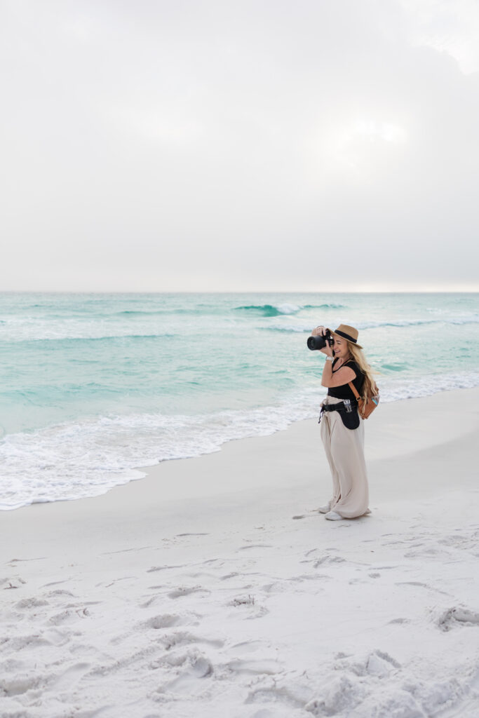 Behind the scenes of Lauren taking wedding photos at Santa Rosa Beach