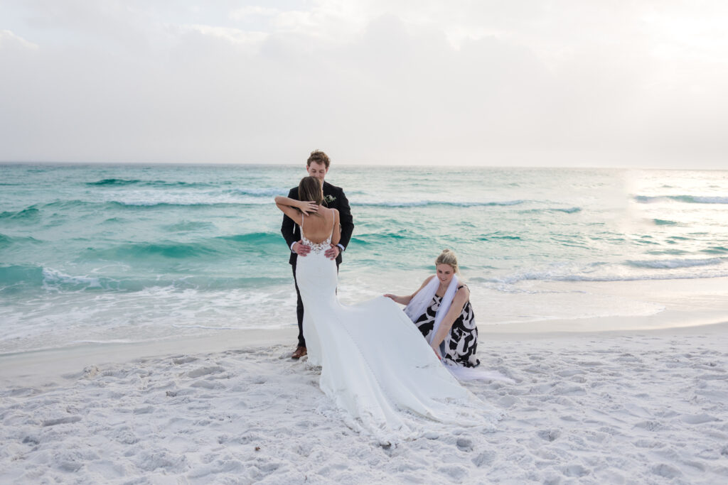 Wedding Planner fixing brides dress