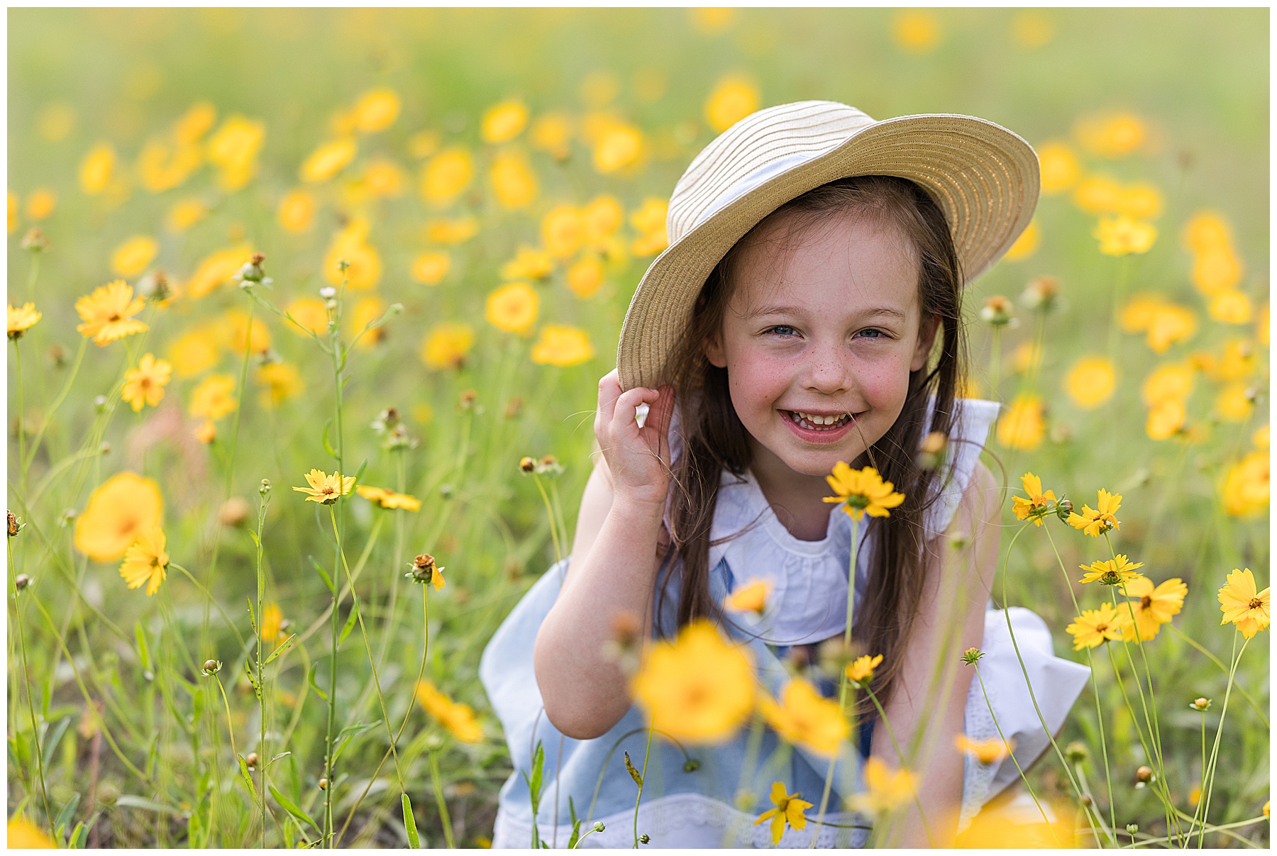 flower field with a little girl