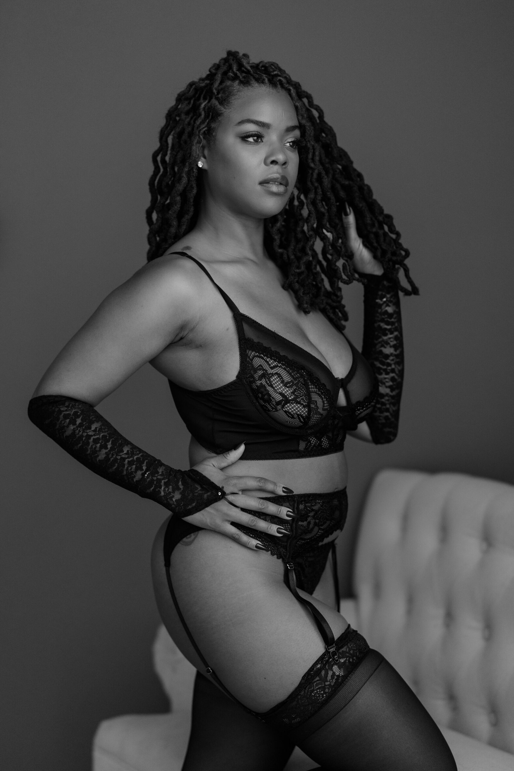 Woman in a classic black lingerie set